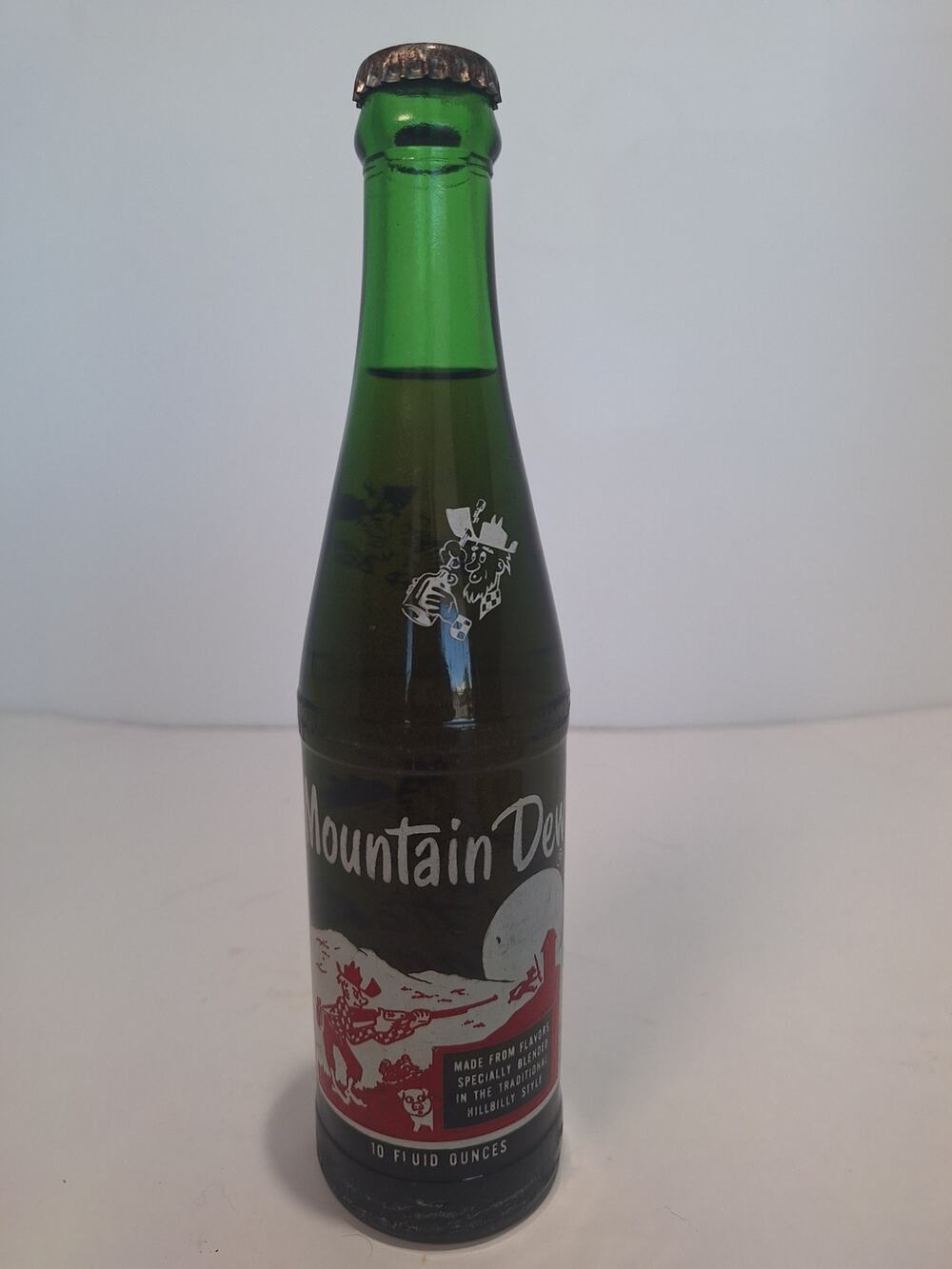 Vintage 1965 Mountain Dew 10 Oz ACL Soda Bottle Unopened "It'll Tickle Yore...."